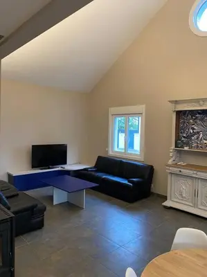 Télévision ou salle de divertissement dans l'établissement Maison ossature bois