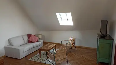Coin salon dans l'établissement Au cœur des vignes