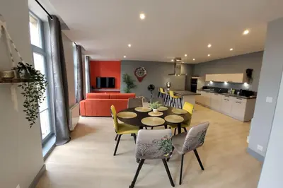 Cuisine ou kitchenette dans l'établissement Appartement Le palais autun