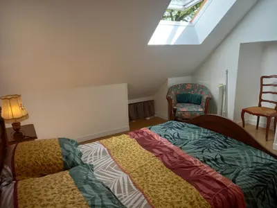 Un ou plusieurs lits dans un hébergement de l'établissement Maison vacances 8 voyageurs