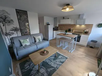 Cuisine ou kitchenette dans l'établissement Le Studio Jungle