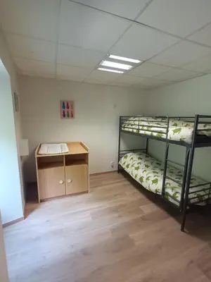 Un ou plusieurs lits dans un hébergement de l'établissement Gîte 4 personnes proche des cascades du Hérisson