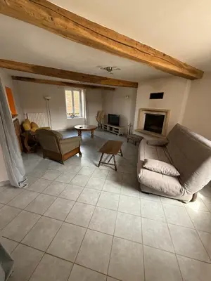 Coin salon dans l'établissement Gîte de la Fontaine