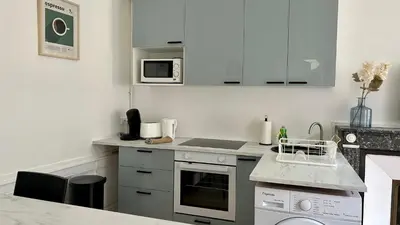 Cuisine ou kitchenette dans l'établissement L'authentique
