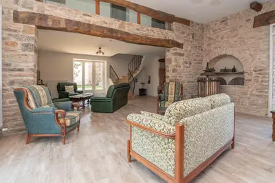 Coin salon dans l'établissement Le Grand Pressoir - Grande maison avec jardin