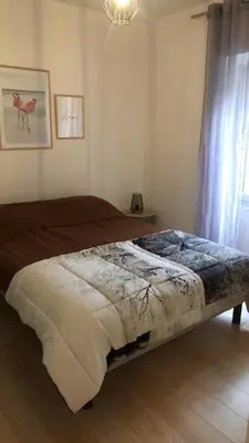 Un ou plusieurs lits dans un hébergement de l'établissement Appartement BELLO , ruelle au cœur de ville, arrivée en autonomie