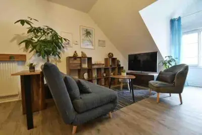 Télévision ou salle de divertissement dans l'établissement Appartement BELLO , ruelle au cœur de ville, arrivée en autonomie