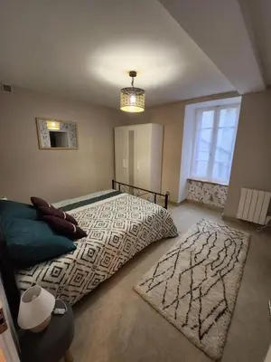 Un ou plusieurs lits dans un hébergement de l'établissement Le p'tit gîte d'Edmé