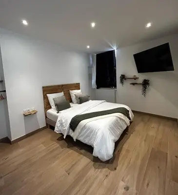 Un ou plusieurs lits dans un hébergement de l'établissement Bella Notte Spa