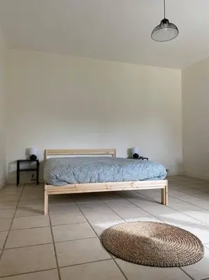 Un ou plusieurs lits dans un hébergement de l'établissement Maison à Pouilly en Auxois