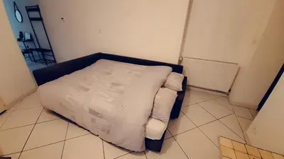 Un ou plusieurs lits dans un hébergement de l'établissement Le-bon-appart de plain-pied avec terrasse