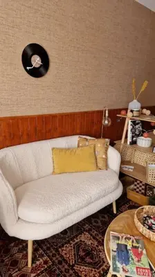 Coin salon dans l'établissement Studio 2 pers aux inspirations 60s