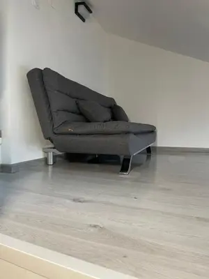 Coin salon dans l'établissement Petite maison de campagne