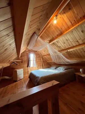 Un ou plusieurs lits dans un hébergement de l'établissement LES CHALETS DE VANESS' le Mahé