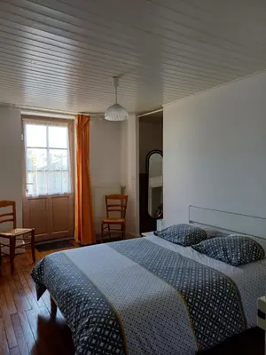 Un ou plusieurs lits dans un hébergement de l'établissement L'authentique Maison cœur de Ladoix-Serrigny