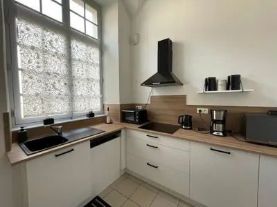 Cuisine ou kitchenette dans l'établissement Le Prieuré