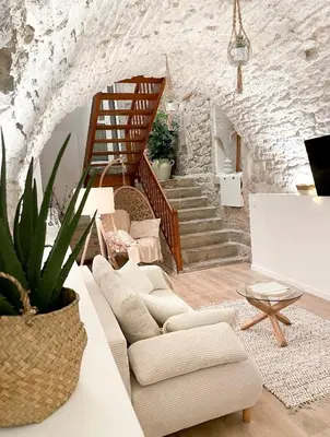 Coin salon dans l'établissement La voute Doloise - Love room & spa