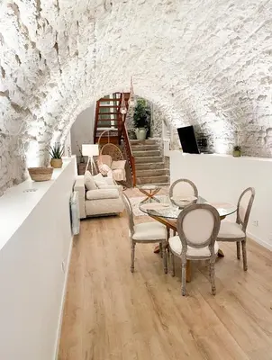 Coin salon dans l'établissement La voute Doloise - Love room & spa