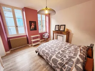 Un ou plusieurs lits dans un hébergement de l'établissement Appartement de Louise et Adrien