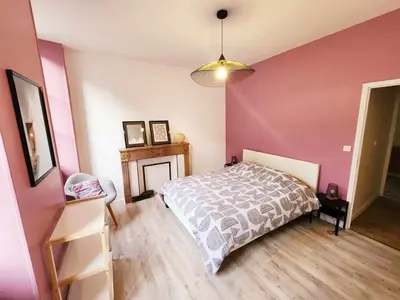 Un ou plusieurs lits dans un hébergement de l'établissement Appartement de Louise et Adrien