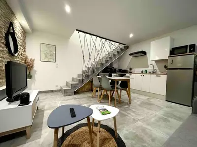 Cuisine ou kitchenette dans l'établissement Grange rénovée en duplex idéalement située