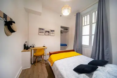 Un ou plusieurs lits dans un hébergement de l'établissement Cabana & Le Sirène - Proche Centre-Ville