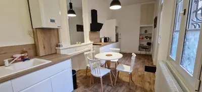Cuisine ou kitchenette dans l'établissement Au coin caché