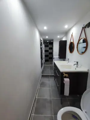 Salle de bains dans l'établissement La maison de vos vacances