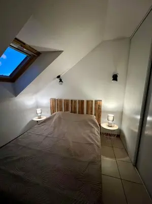Un ou plusieurs lits dans un hébergement de l'établissement Chez Jack-Résidence-Piscine-Sauna