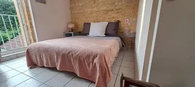 Un ou plusieurs lits dans un hébergement de l'établissement Escape4Dijon