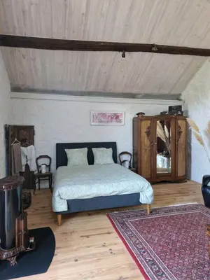 Un ou plusieurs lits dans un hébergement de l'établissement Gîte La Sarrée