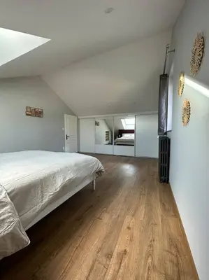 Un ou plusieurs lits dans un hébergement de l'établissement Gîte 10 personnes avec spa privatif