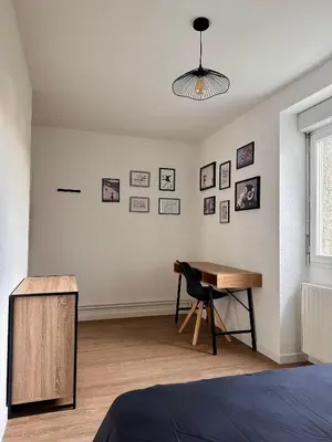 Un ou plusieurs lits dans un hébergement de l'établissement L'Atelier loft