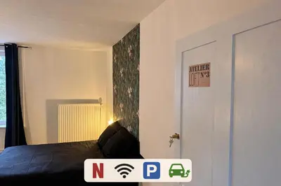 Un ou plusieurs lits dans un hébergement de l'établissement L'Atelier loft