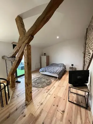 Un ou plusieurs lits dans un hébergement de l'établissement Duplex belle pierre
