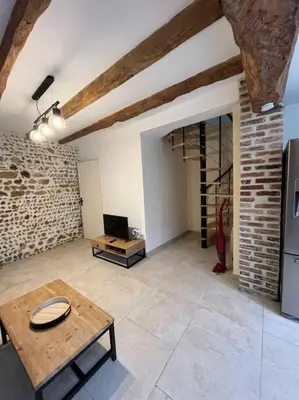 Télévision ou salle de divertissement dans l'établissement Duplex belle pierre
