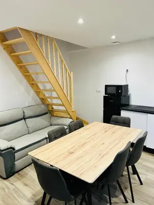 Coin salon dans l'établissement Petit Confort en Bresse