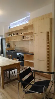 Cuisine ou kitchenette dans l'établissement Lons appartement T1 centre ville