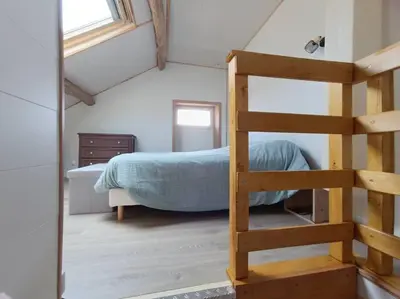 Un ou plusieurs lits dans un hébergement de l'établissement La coco's house