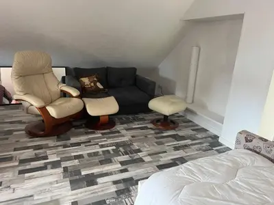 Coin salon dans l'établissement Gîte de l’eau de l’ange