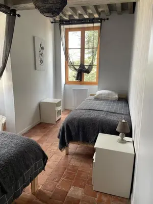 Un ou plusieurs lits dans un hébergement de l'établissement Gîte La Bancale