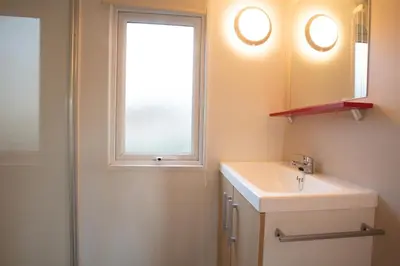 Salle de bains dans l'établissement CAMPING LA CLE DE SAONE
