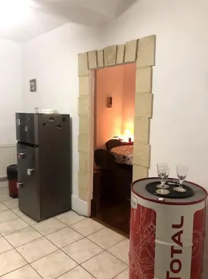 Cuisine ou kitchenette dans l'établissement La maison de Jeanne