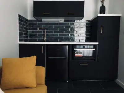 Cuisine ou kitchenette dans l'établissement Joli duplex