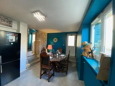 Télévision ou salle de divertissement dans l'établissement Au Lavoir