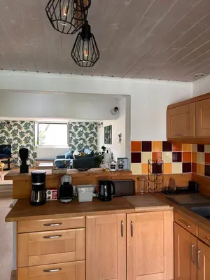 Cuisine ou kitchenette dans l'établissement La maison de Lilylou