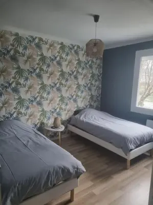 Un ou plusieurs lits dans un hébergement de l'établissement Gîte Saint Romain