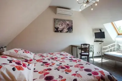 Un ou plusieurs lits dans un hébergement de l'établissement Gîte Les Hirondelles