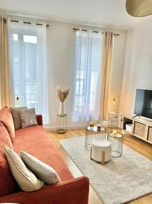 Télévision ou salle de divertissement dans l'établissement Appartement avec magnifique vue sur la Saône et son balcon
