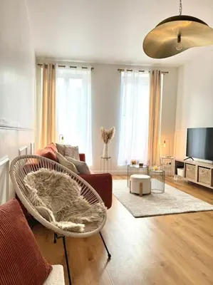 Coin salon dans l'établissement Appartement avec magnifique vue sur la Saône et son balcon